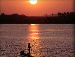 Fisherman on Backwater Lagoon - Kerala