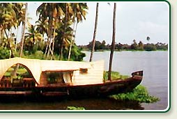 Houseboat on Palm fringed Kerala backwaters 