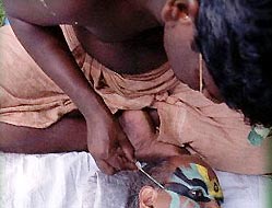 Kathakali Performer getting ready for performance