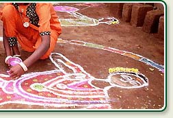 Rice powder paintings during the Pongal festival 